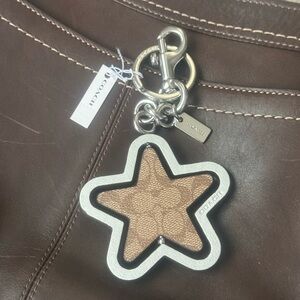 NWT COACH SIGNATURE SPINNING STAR CHARM